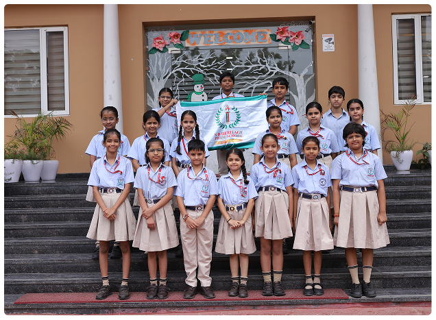 Students smiling safely in front of school campus building